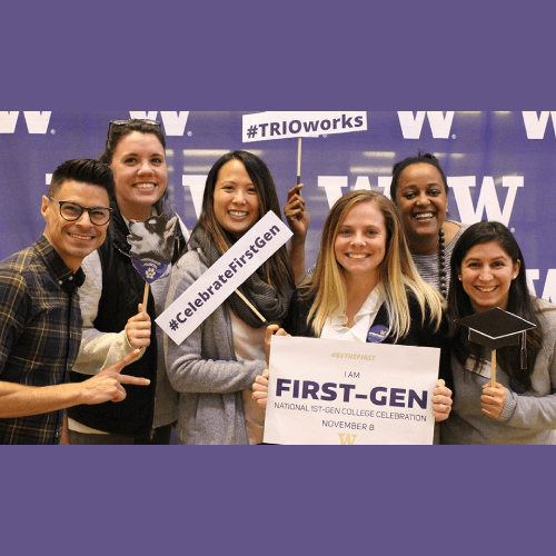 First-Gen students with signs
